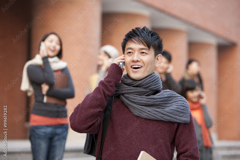 College students on the phone on campus