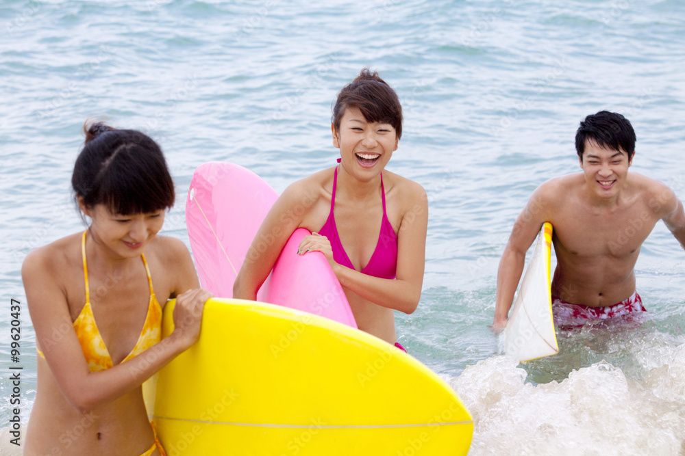 Friends ready to surf