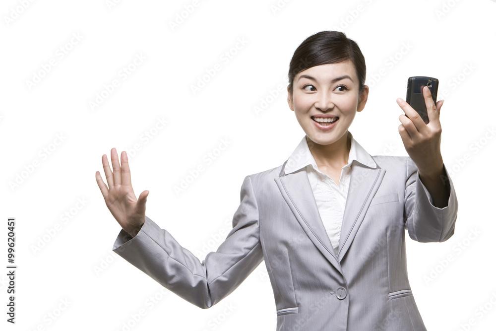 Businesswoman using cellphone