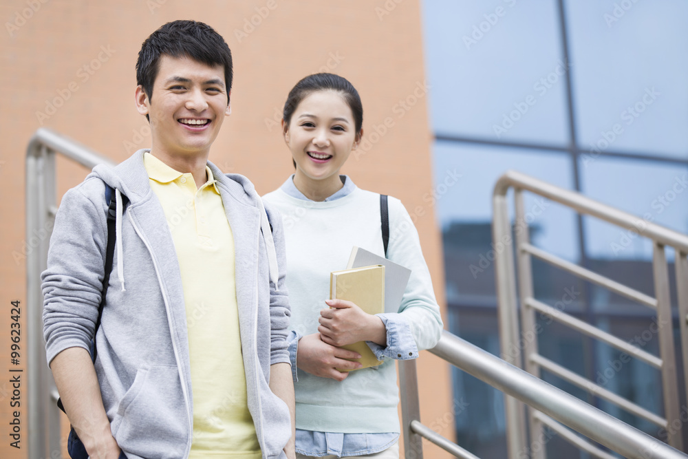 Young couple outside library