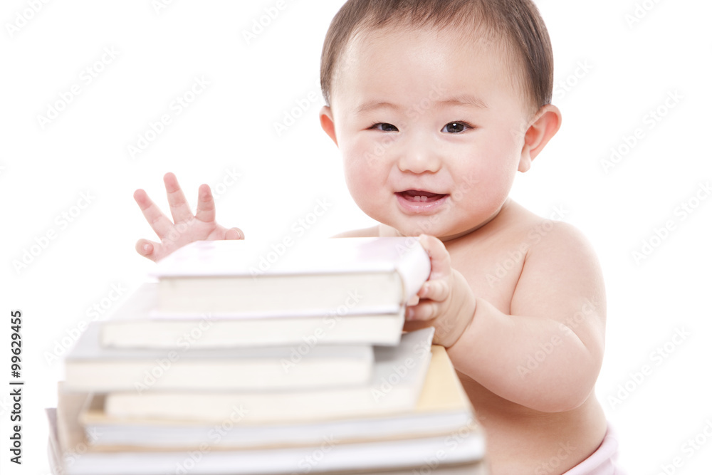 Smart baby girl with books