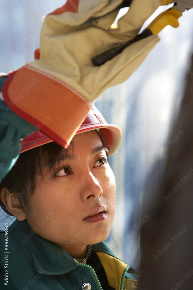 Woman Working In A Construction Site