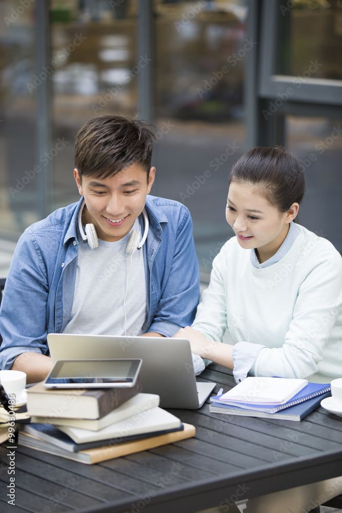 Young couple studying