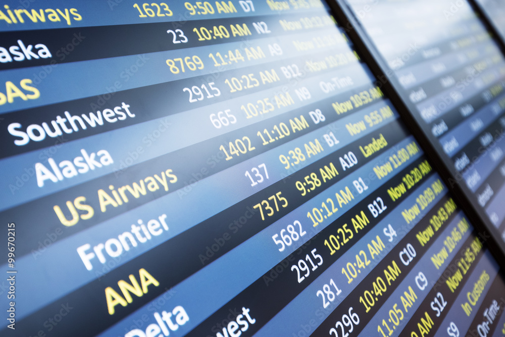 info of flight on billboard in airport