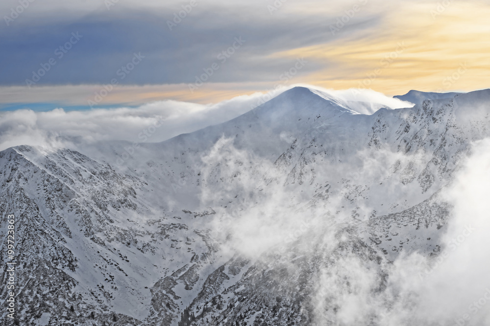 Sun and clouds atop of Kasprowy Wierch in Zakopane on Tatras in