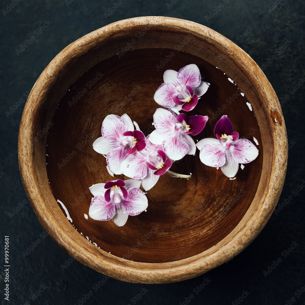 Spa background with floating flowers