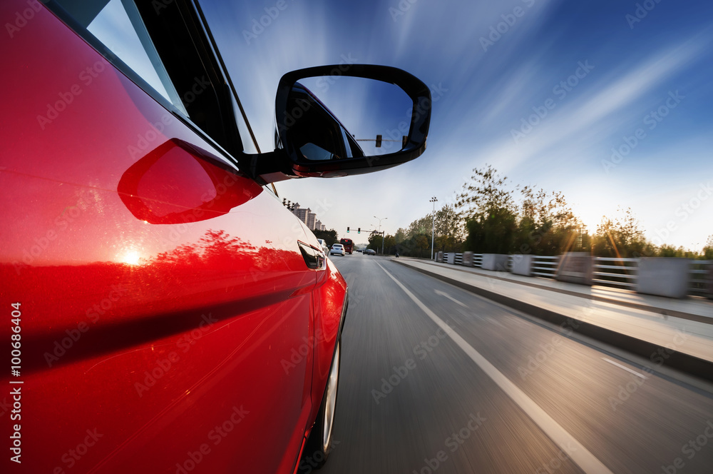 car on the road with motion blur background.