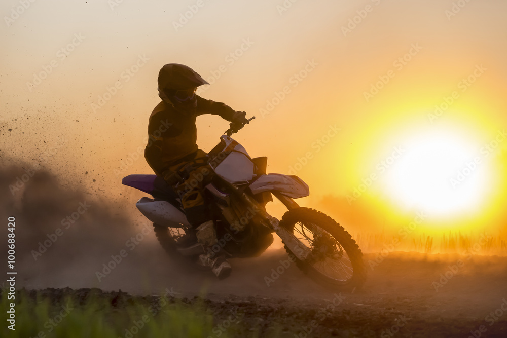 Silhouette motocross speed in track