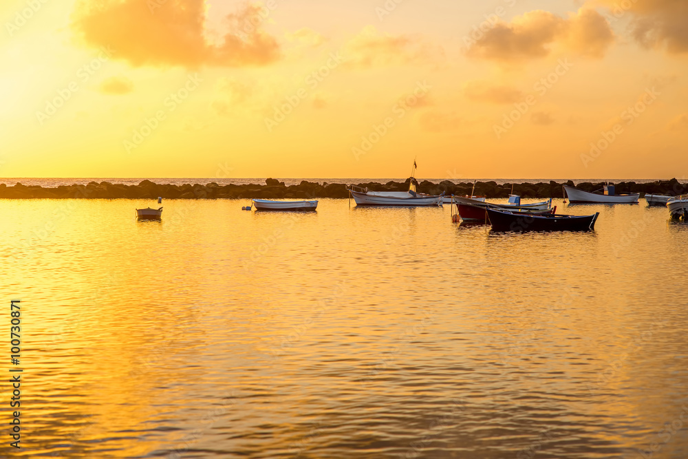 Fishing boats on the sunrise