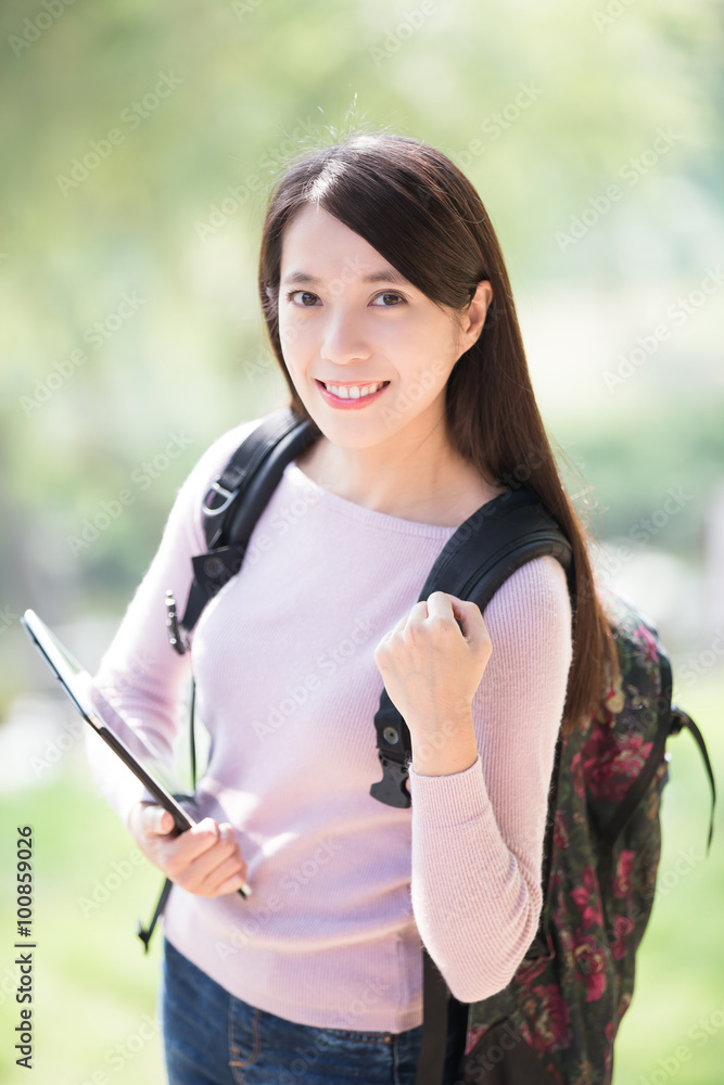 woman student with digital tablet