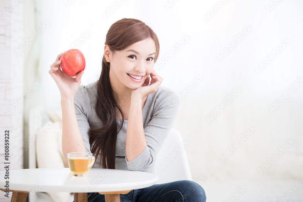 woman hold red apple