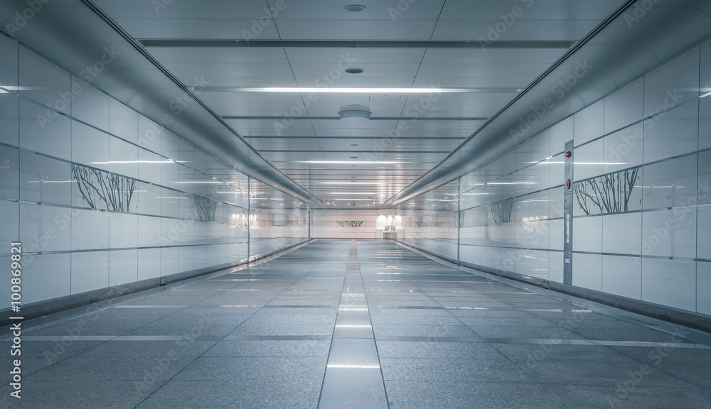 Perspective of Empty underground passage at night