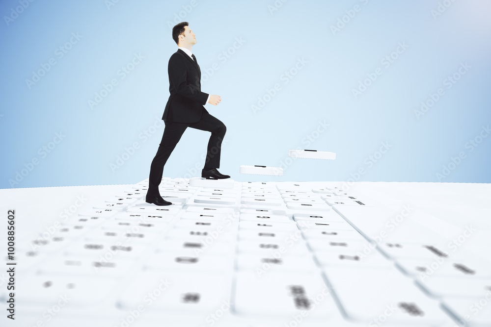 Businessman climbing stairs keyboard buttons