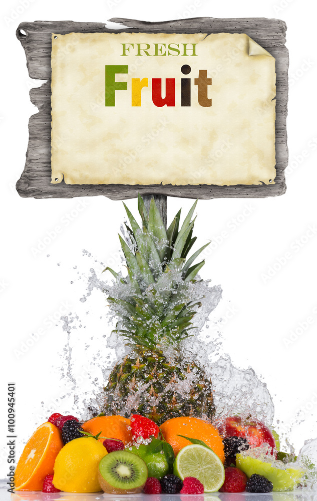 Fresh fruit in water splash and wooden board