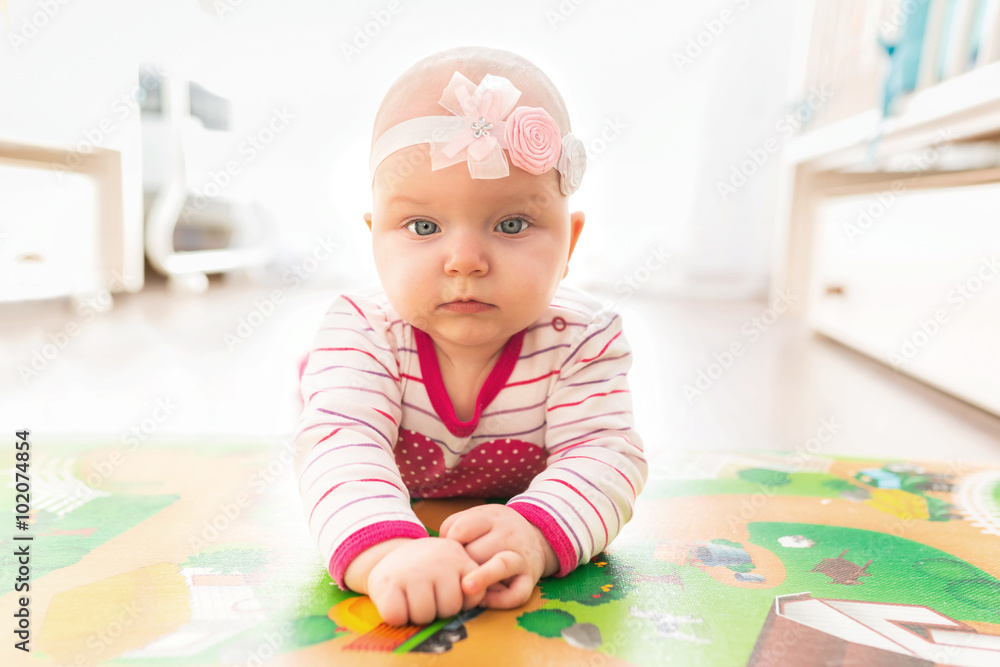 Baby girl crawl on the floor