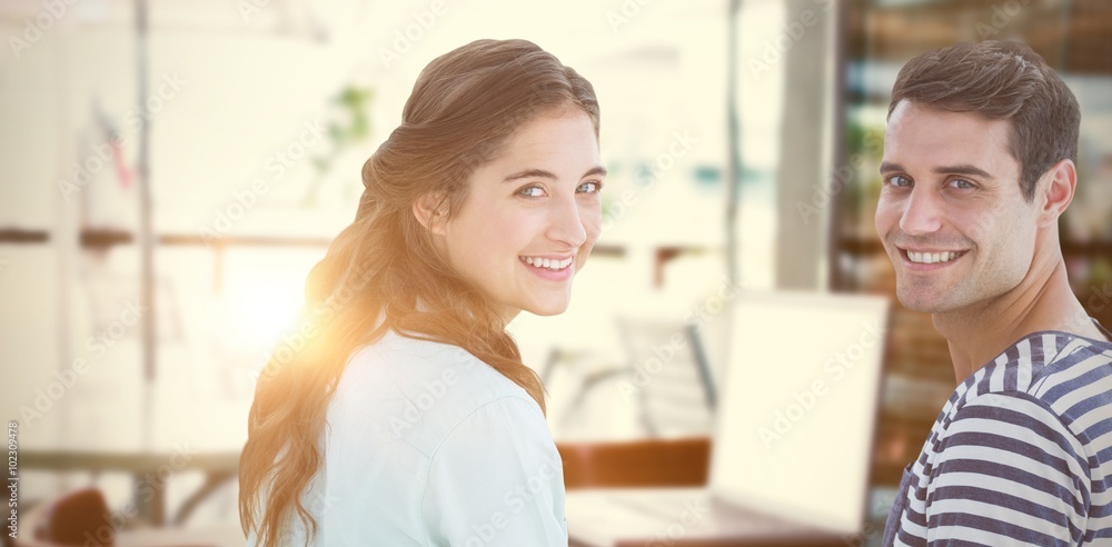 Composite image of couple looking at camera 