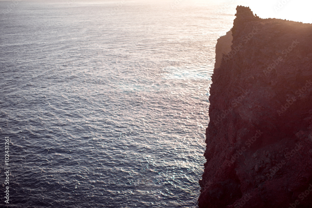 Vertical mountain cliff on the island coast