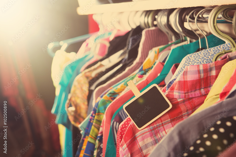 Clothes hanging on the rack in the store