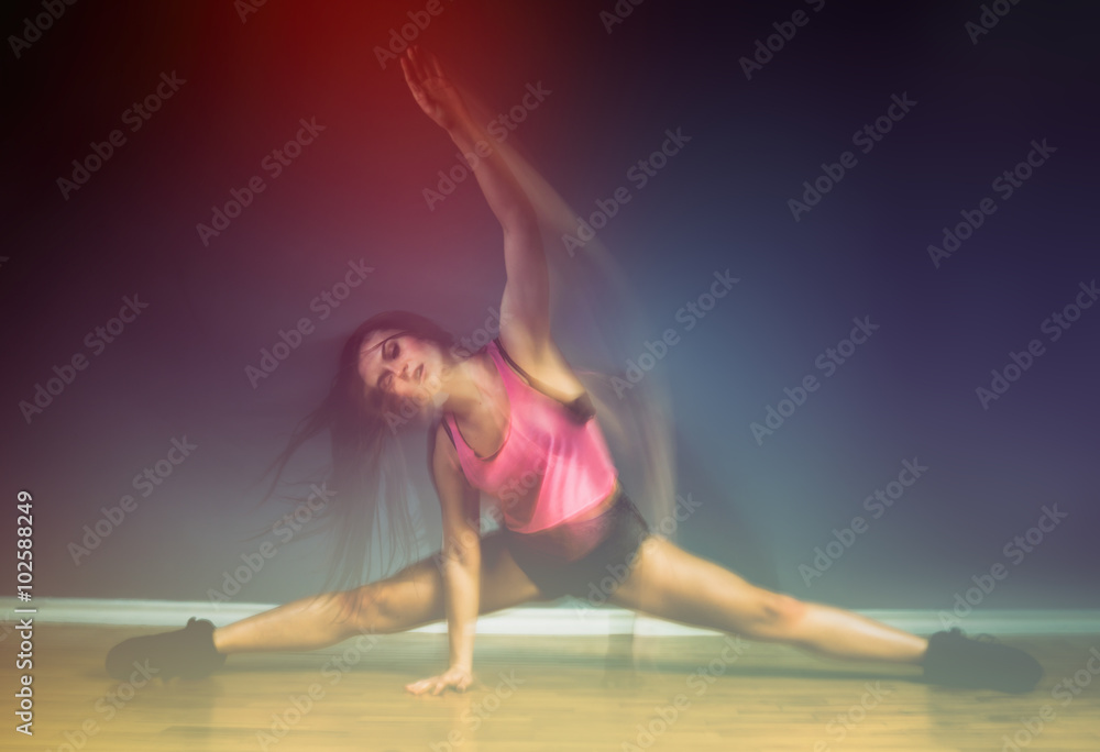 Modern hip hop dancer woman, motion blur