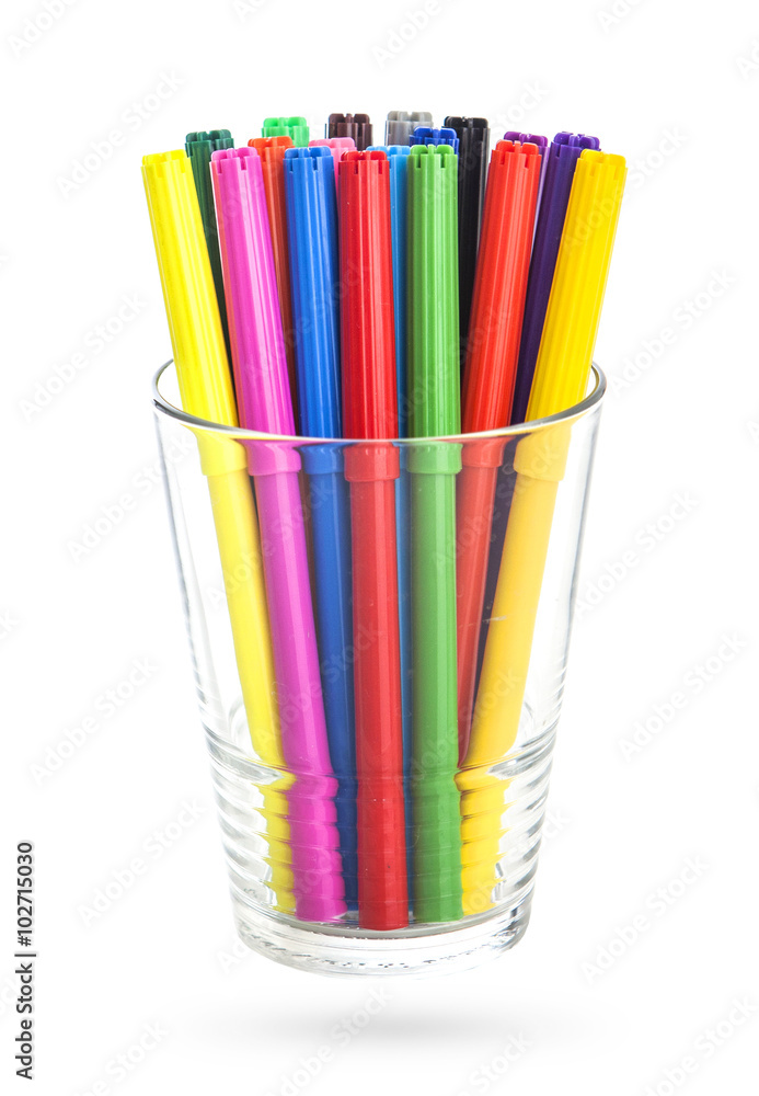 colorfull felt-tipped pens in a glass, isolated