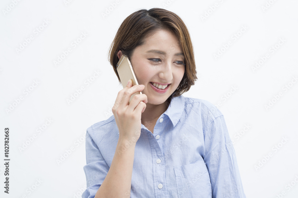 Women are talking on a mobile phone