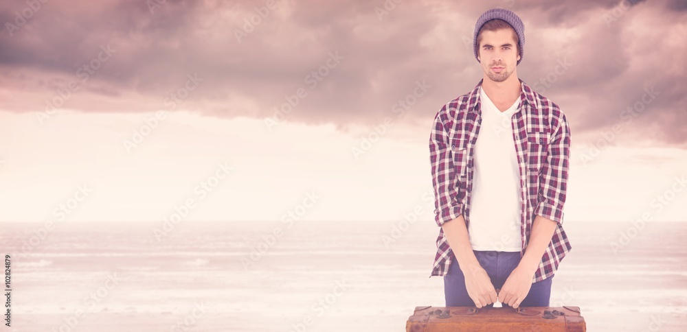 Composite image of portrait of confident man holding bag