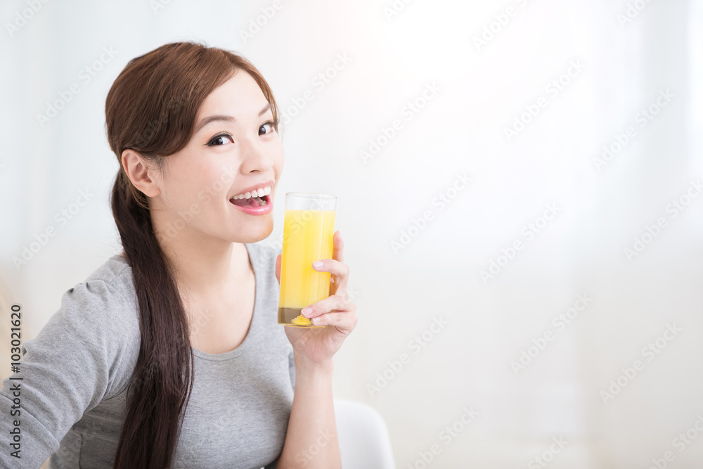 woman hold orange juice