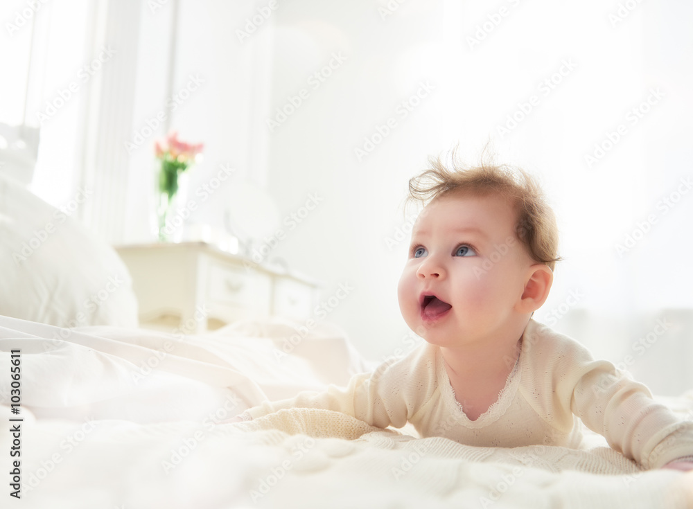 baby girl on the bed