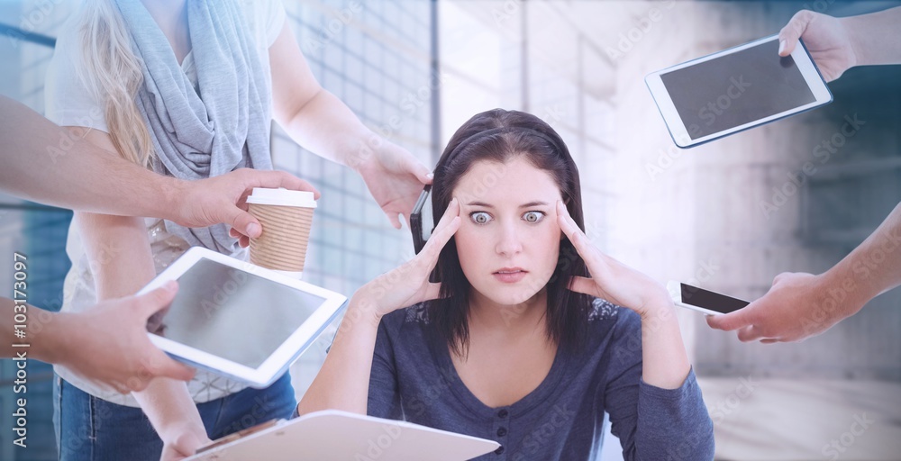 Composite image of businesswoman having headache 