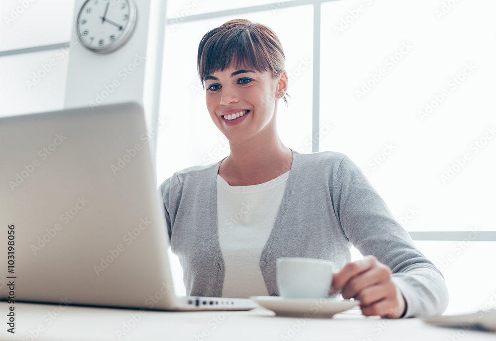 Businesswoman having a coffee break