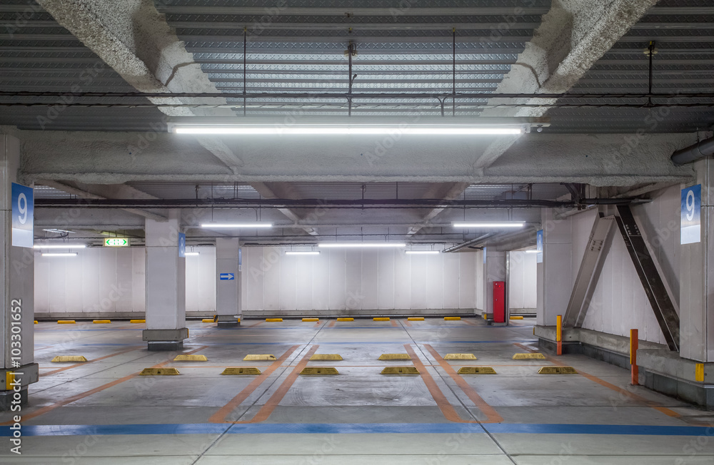 Empty space car park interior at night