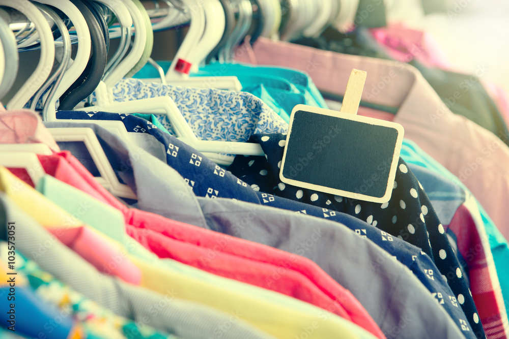 Clothes hanging on the rack in the store