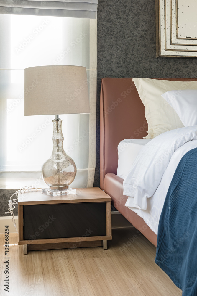 classic white lamp on wooden table set