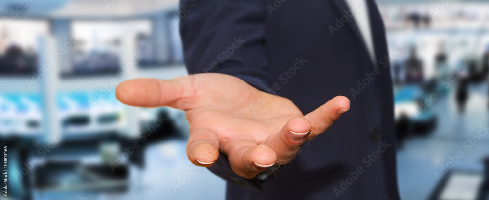 Young man on office background