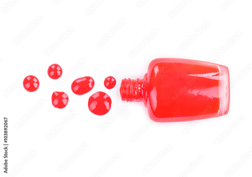 Red nail polish on a white background