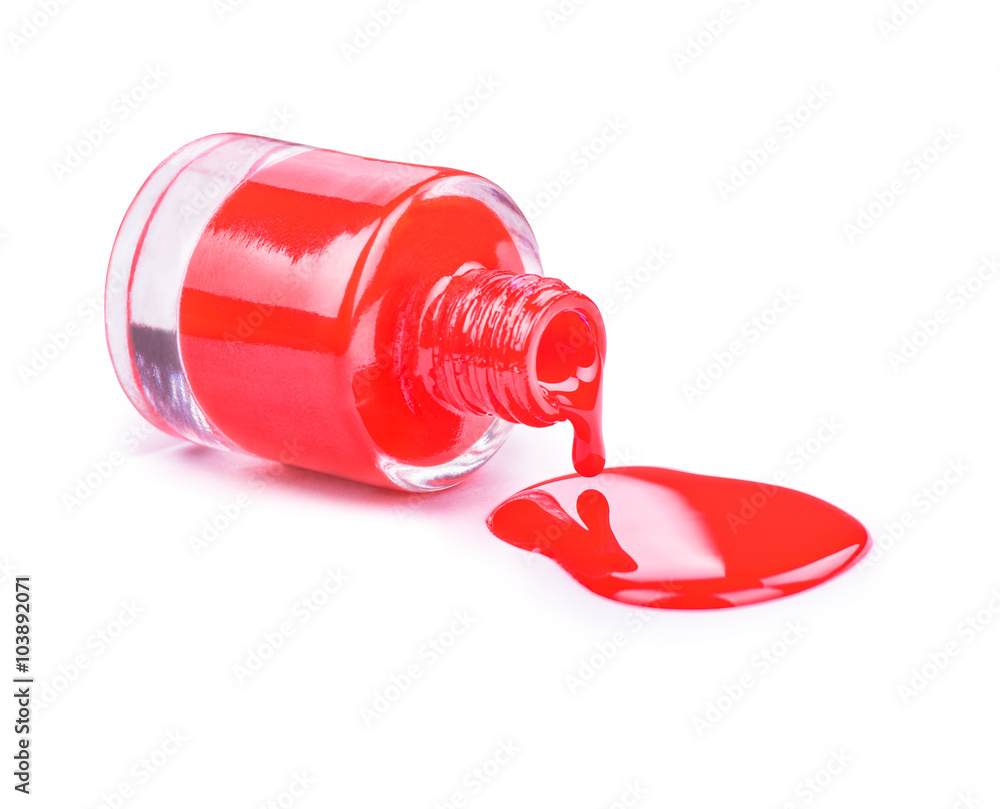 Red nail polish on a white background