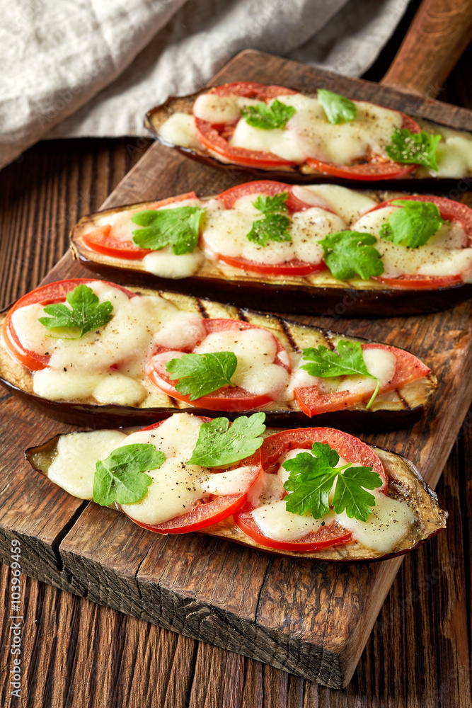 Baked eggplant with tomatoes and cheese