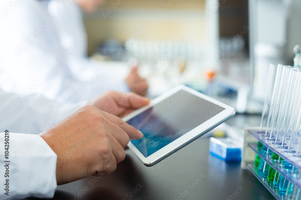 people doing chemical experiment in modern lab