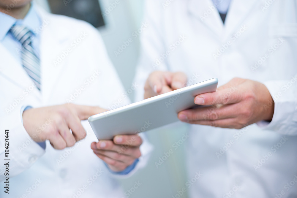 people analysis chemical experimental data with tablet