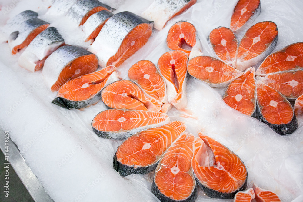 frozen red fish steaks in a market