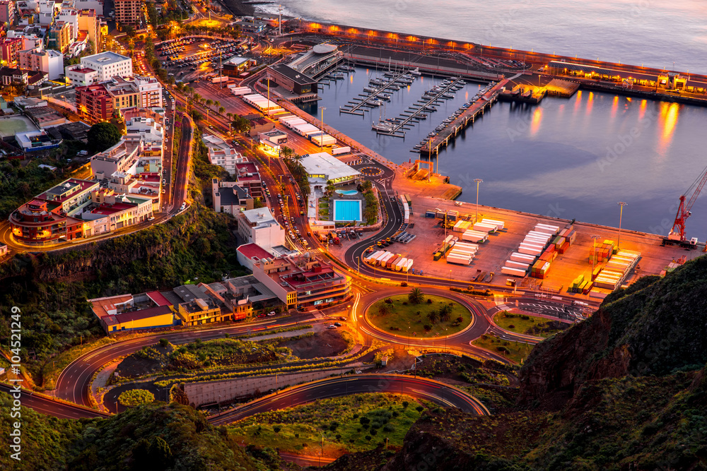 Aerial view on illuminated Santa Cruz city on the dusk on La Palma island in Spain