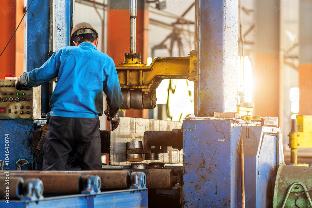 Steel plant workers at work.