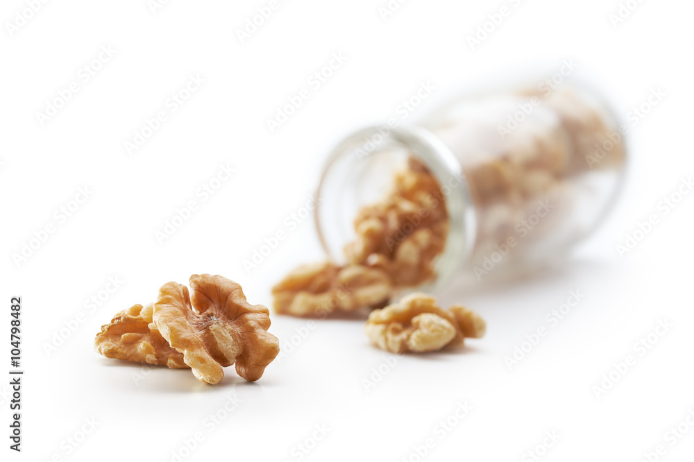 Walnuts Pouring Out From Bottle