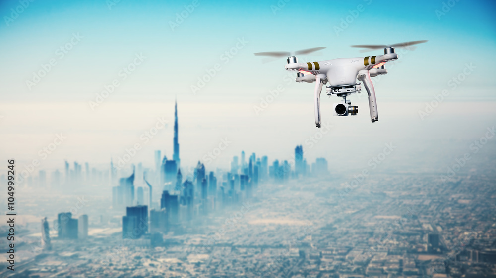 Drone flying above Dubai city panorama