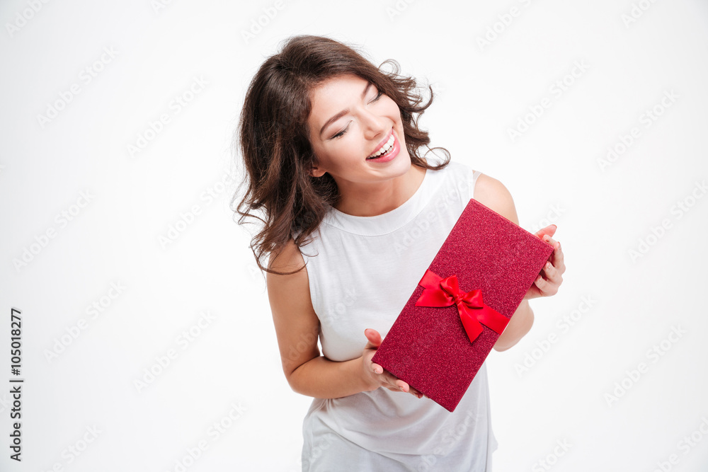 Laughing woman holding gift box