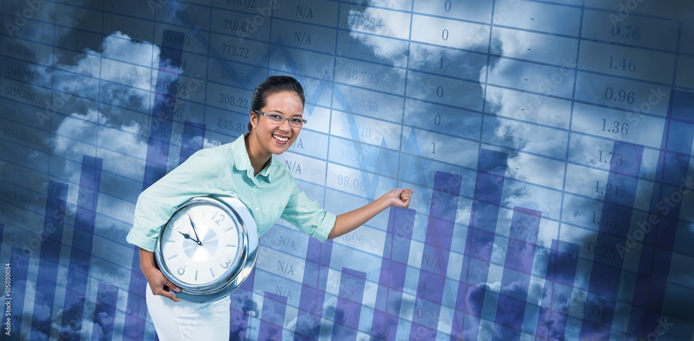 Composite image of delighted businesswoman holding a clock