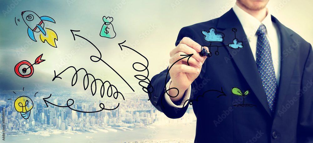 Businessman drawing Arrows with cartoon concept