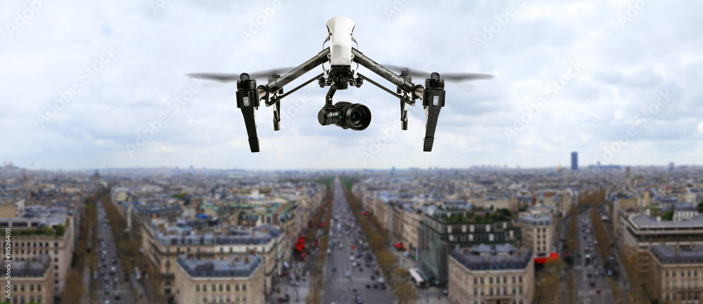 Drone flying above Paris city panorama