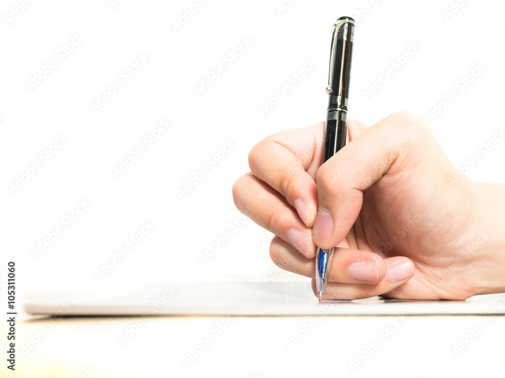 Hands with pen on notebook isolated on white background