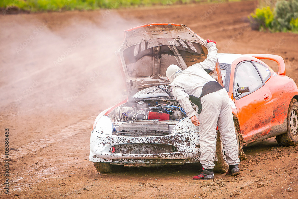 Driver opened the hood of the car